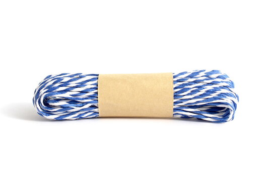 On a white background there is a white and blue rope in a package.