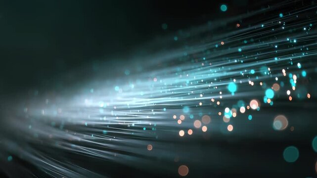 Vivid fiber optic strands and sparkling bokeh dots form a modern, energetic visual. This abstract image symbolizes data transfer, connectivity, and digital transformation in a tech driven world