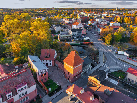 The market square in Starogard Gdanski in the light of the setting sun at autumn. Poland
