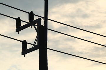 Obraz premium Closeup Eletricity line and electricity post