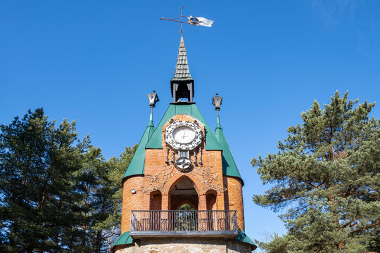 The Town Hall clock tower in close-up. The fabulous town of Andersengrad, Sosnovy Bor, Leningrad Region