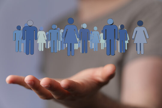 Symbolic image depicting a community, held in hand, conveying teamwork and human connection. Ideal for illustrating coll