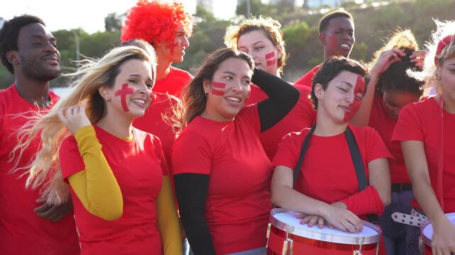 Sad multiracial sport fans people outside of football stadium - Group of red football supporters lose outdoor 