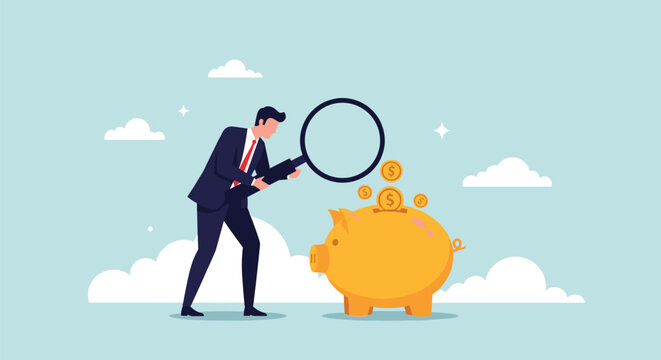 Curious businessman using a large magnifying glass to inspect a golden piggy bank with coins representing financial auditing.