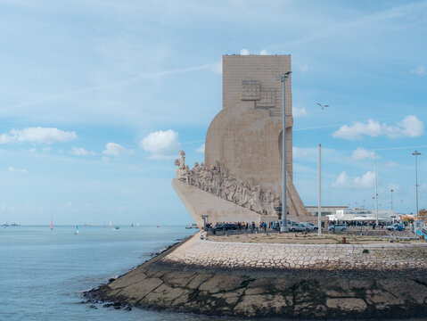 View of the stark, imposing Padrao dos Descobrimentos monument juts into the Tagus River under a vast sky, its stone figures telling tales, Lisbon, Lisbon, Portugal.