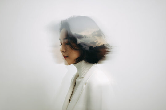 Abstract portrait with motion blur effect creating a sense of movement and emotion.