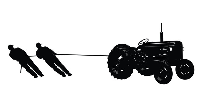 Farmers pulling a vintage tractor with a rope striking black silhouette