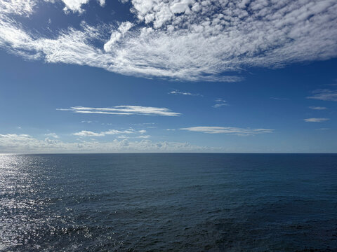 Blue ocean and beautiful sky clouds.