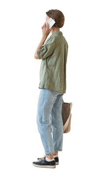 Full length portrait of young woman standing and talking on mobile phone isolated transparent PNG, student girl full body photo PNG with transparent background precisely cut out with clipping path.
