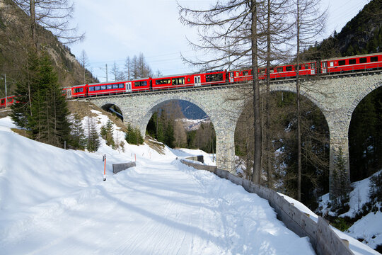 Train driving across a Railway Viaduct between Preda and Bergun, Albula, Graubunden, Switzerland