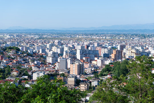 Aerial cityscape with a mountain backdrop, Durres, Albania
