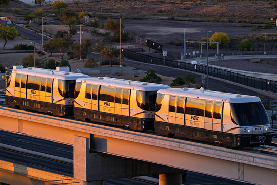 sky harbor airport 3-14-2026 Phoenix, AZ USAPHX Sky Train sunset arrival into East Economy Parking at Phoenix Sky Harbor Intl. Airport.