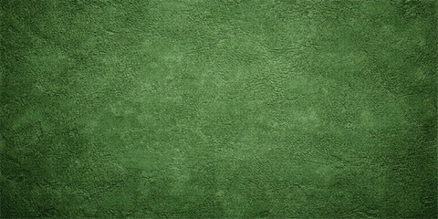 Fototapeta premium An old green grunge paper texture provides a blank nature backdrop with a weathered grass turf pattern on an empty canvas surface