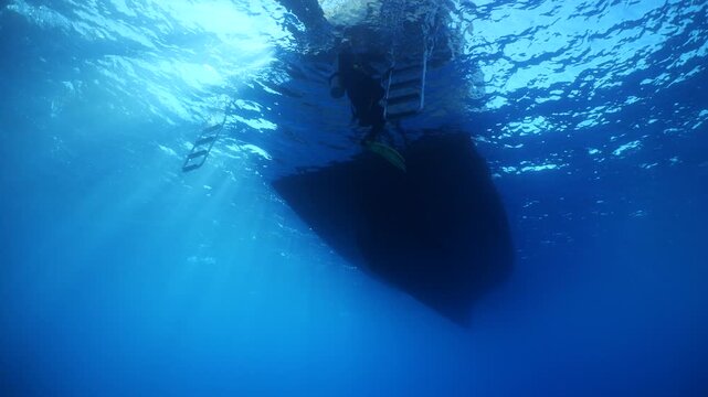  underwater under the boat fish around slow relaxing ocean scenery 