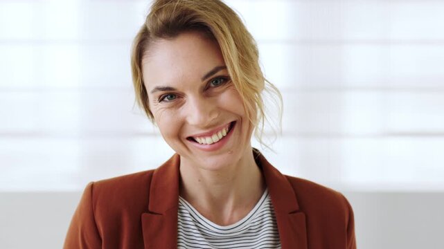 Smile, face and woman in office for journalist, creative experience and pride for about us. Business, journalism and laugh at publishing agency for career development, news reporting and growth