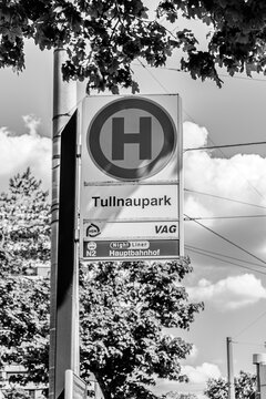 Nuremberg, Germany- May 1, 2025: Tullnaupark bus station sign for busses run by VAG company in Nuremberg in black and white