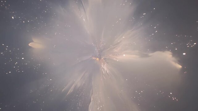 A massive supernova explosion occurs in outer space with stars