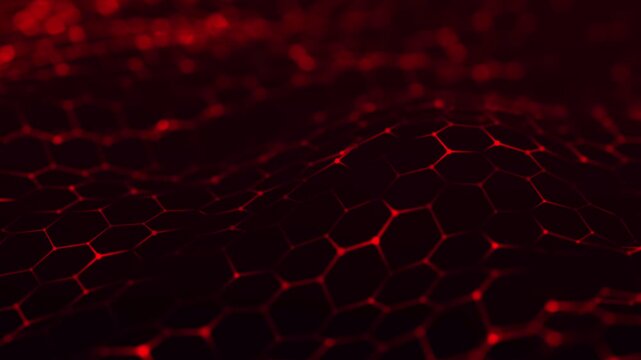 An animated futuristic hexagonal background. The red hexagonal grid undulates smoothly, like living digital fabric. Honeycomb structure. Animation in 4K resolution.