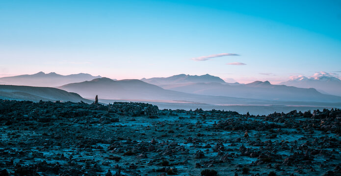 Gorgeous sunrise panorama of the Peruvian Andes near Arequipa with volcanoes in the background