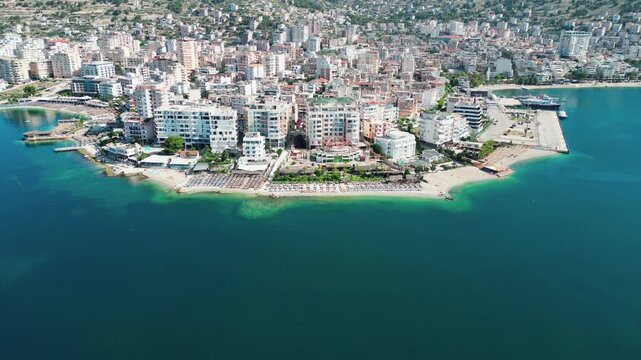 Saranda Coastal City Aerial 4K Drone View, Albania &ndash; Panorama of Waterfront, Marina with Yachts, Ionian Sea and Mediterranean Travel Destination