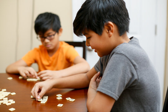 Native American Children Studying Together at Home Focused Learning