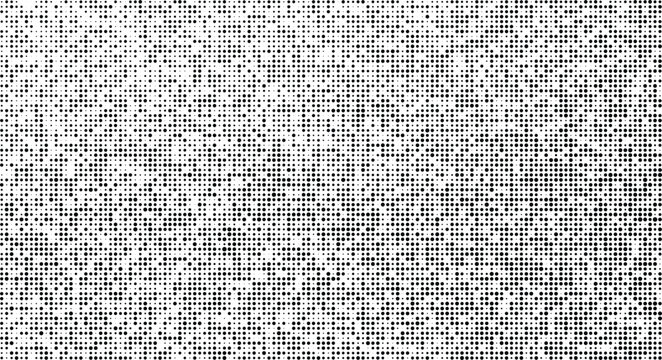 Abstract halftone dot pattern with random black and gray dots on a uniform background, full frame texture.