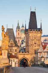 Fototapeta premium charles Bridge in Prague Czech Republic at sunrise with historic statues