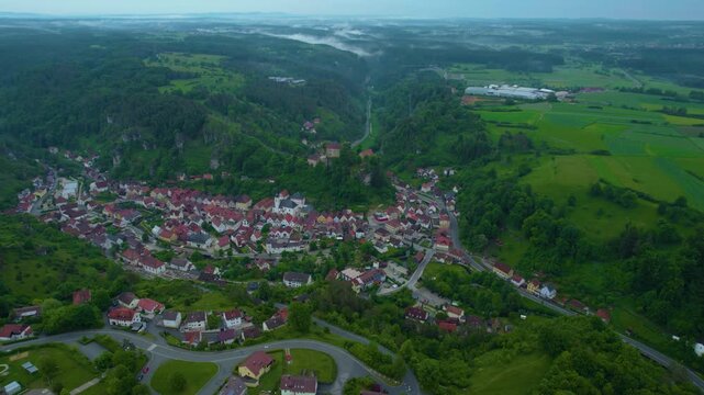 Aerial view of the city Pottenstein in Germany, Bavaria on a cloudy day in Spring