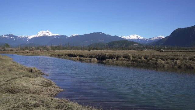 Mamquam and Garibaldi Mountains from the Squamish Estuary 4K UHD. The view of Mamquam and Garibaldi Mountains from the Squamish Estuary. 4K, UHD.
