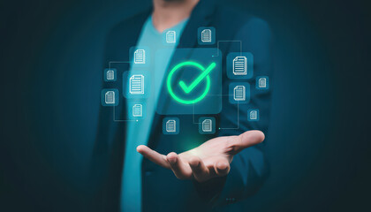 Fototapeta premium Digital document management system, businessman holding glowing green check mark icon, electronic data verification and compliance concept