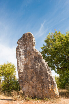 Menhir of Belinac stands tall in Regional Park of Causses du Quercy near Livernon in southwest France
