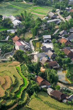 View of paddy-fields and village from Quan Ba Pass in Ha Giang province, Northern Vietnam