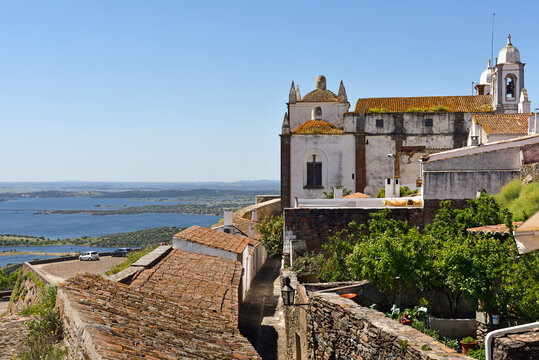View of Monsaraz village and the Alqueva lake from a historic vantage point in Portugal