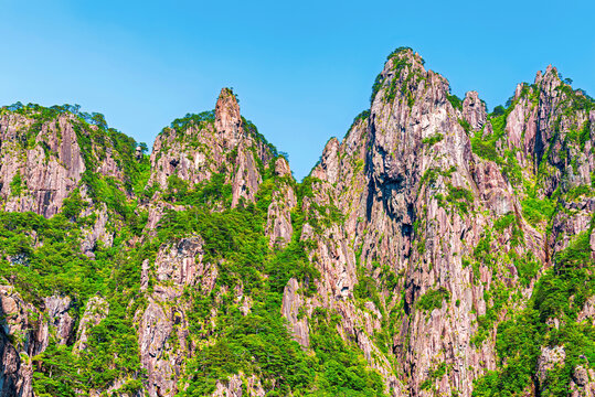Explore the rugged peaks of Huangshan in Anhui Province, a UNESCO World Heritage site showcasing natural beauty and diverse landscapes