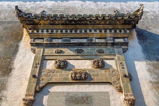 Decorative stone carvings on the doorway of a village home in ShiTing Village, Huangshan City, Anhui, China