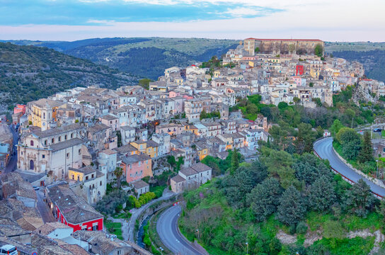 Elevated view captures the landscape and buildings of Ragusa Ibla in Sicily during the evening hours