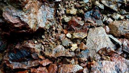 Fototapeta premium Rough Wet Rocks and Gravel Texture Close Up