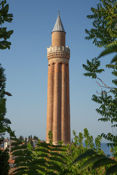 Fluted minaret of Yivli Mosque stands tall in the Old Town of Antalya, reflecting the architectural style of the 13th century