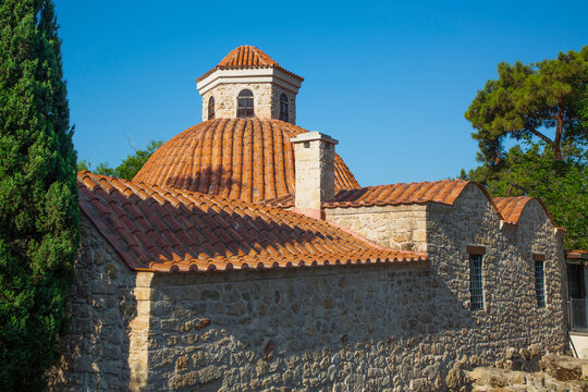 Historic Dervish Lodge Museum displays traditional architecture and roofing in Antalya, Turkey