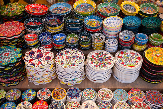 Souvenirs dishware for sale at Arasta Bazaar in Istanbul showcasing various unique designs and vibrant colors