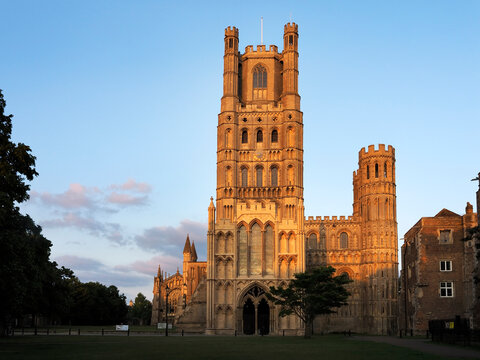 Ely Cathedral stands against a sunset sky in Cambridgeshire, showcasing its timeless architecture and historic significance