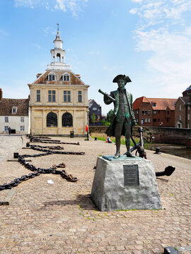Statue of George Vancouver in Kings Lynn Norfolk near the historic town hall and large chains