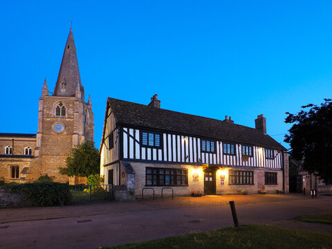 St Marys Church and Oliver Cromwells House stand together in Ely, showcasing history and architecture in the evening light