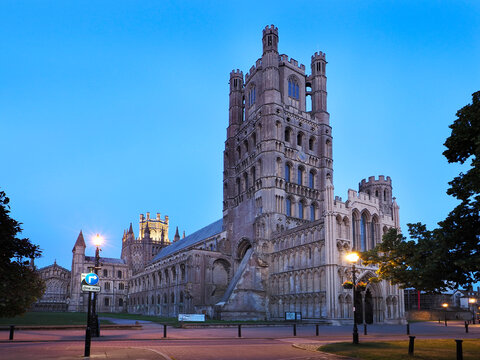 Ely Cathedral stands tall against the evening sky in Ely Cambridgeshire as dusk falls