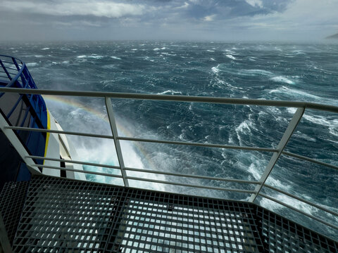 Gale force winds challenge National Geographic Resolution in Tanaga Bay Alaska while passengers experience the rough seas