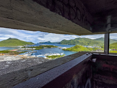 View from the remains of a World War II bunker in Dutch Harbor, Unalaska, Alaska overlooking the landscape and harbor area