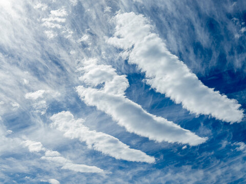 Unusual cloud formation stretching across the sky near Isla del Carmen in Baja California Sur, Mexico, attracts attention from locals and visitors