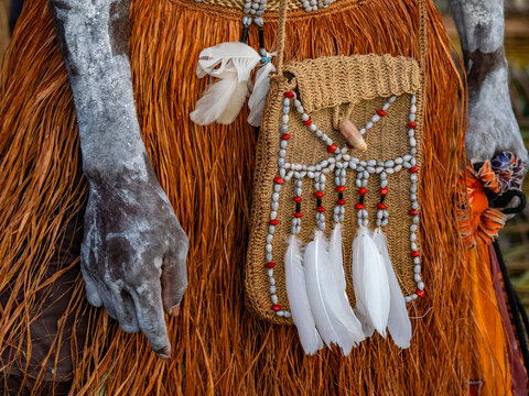 Detail of a satchel worn during a greeting ceremony in Per, highlighting cultural craftsmanship from Papua, Indonesia