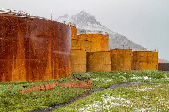 Views of the old structures of the abandoned whaling station in Grytviken on South Georgia Island during snowfall