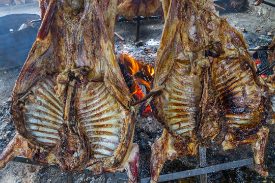 Fire roasted sheep asado at Cerro Castor near Ushuaia, Argentina, showcasing local tradition and culture in cooking